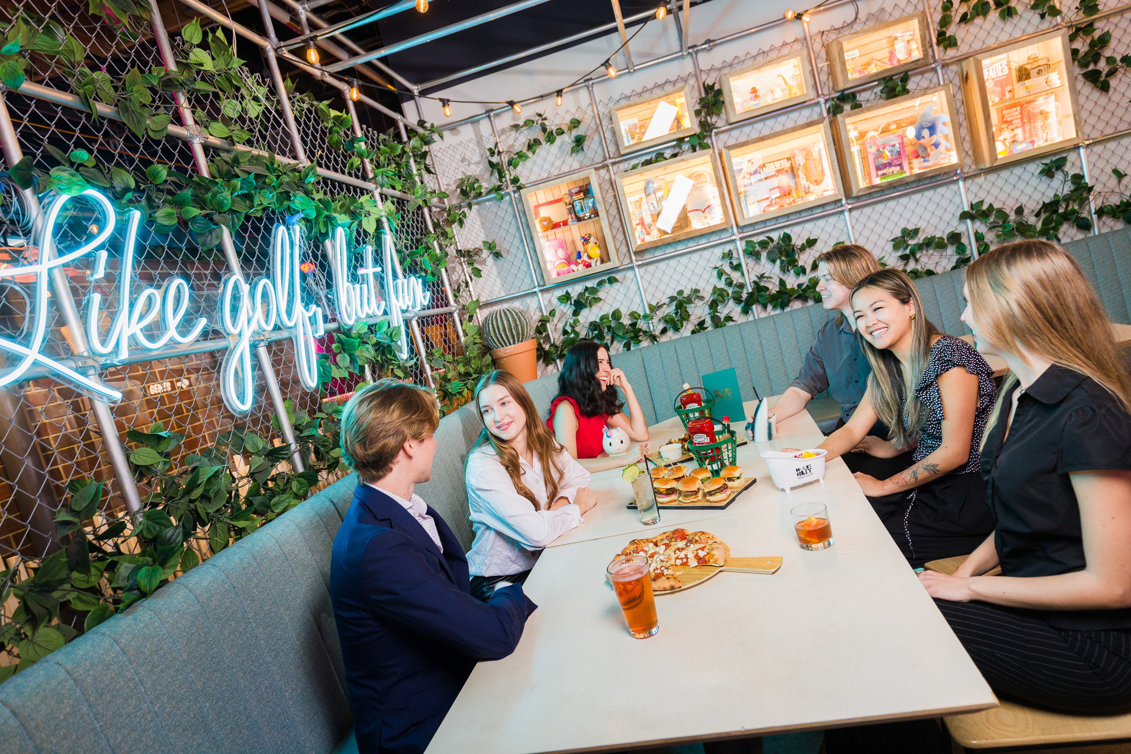 Final polished brand photo displayed across multiple marketing touchpoints: the same hero image shown on a website homepage, Instagram feed, and printed brochure, demonstrating how one great shot serves multiple channels