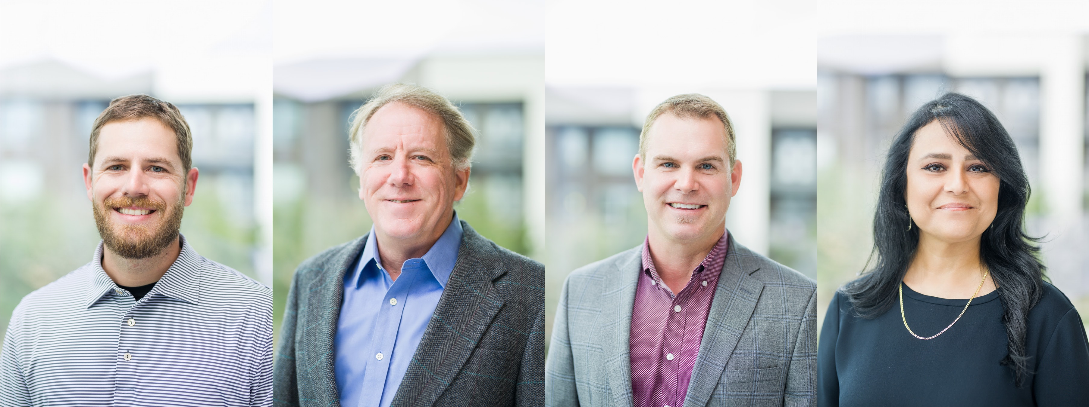 a set of company headshots in consistent lighting with a soft architectural backdrop, natural soft light, and varied expressions showing employee personalities.