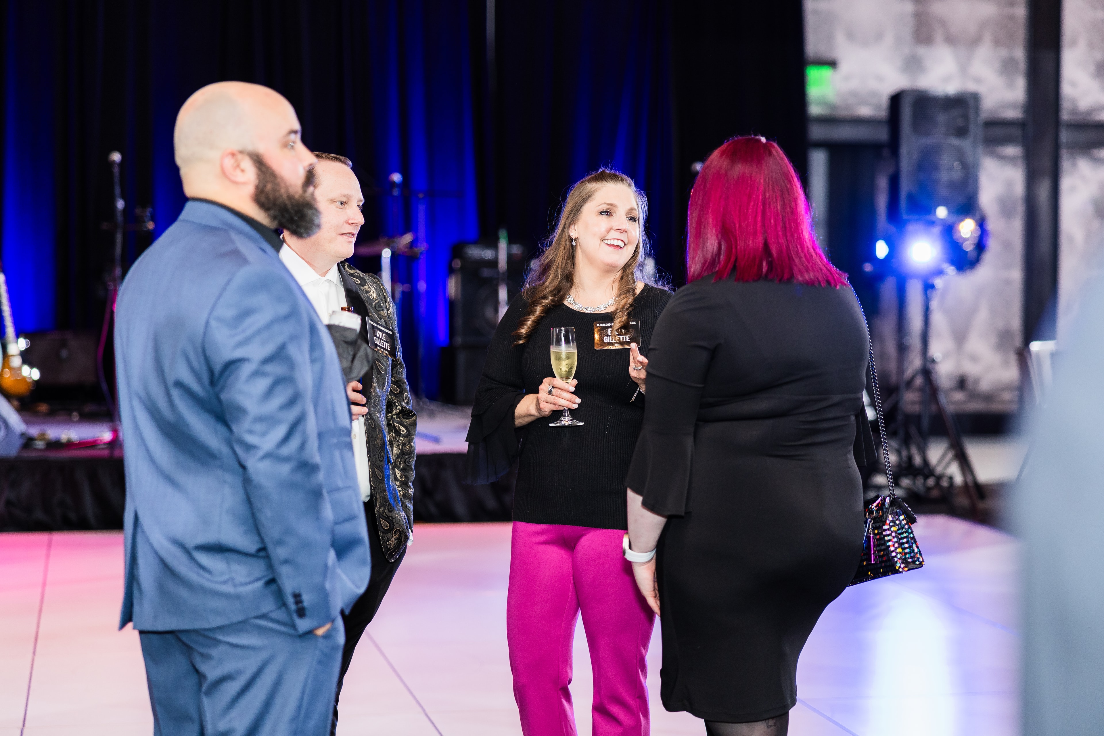 group of people enjoying conversation at a corporat event, candid, natural